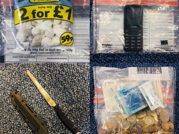 Two suspected drug dealers in Blackpool fled when challenged by police officers  but dropped their loot, according to the force.
