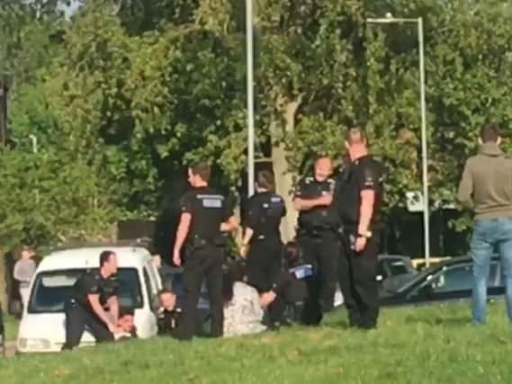 Six people remain in custody in connection with an incident in Essex that saw two police officers hospitalised after having petrol thrown over them.