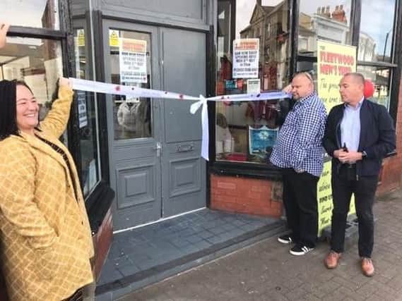 A new Men's Shed shop is opened in Fleetwood by  Gail Martin, of Lancashire Care NHS Foundation Trust, Tony O'Neill (centre) founder and committee member of the Fleetwood branch and  Mark Spencer of Healthier Fleetwood, who cut the ribbon.