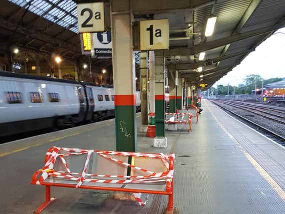 The seats taped up at Preston station's Platforms One and Two