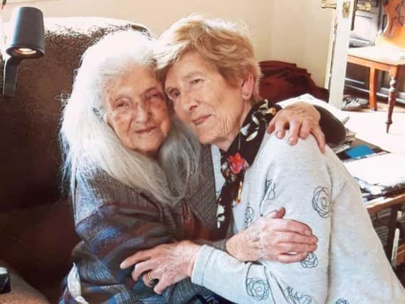 Eileen Macken (right) with her 103-year-old mother Elizabeth who she has met for the first time.