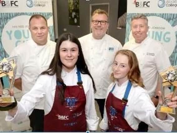 Highfield Academy's winning young chefs Katie Weeks and Ruby Williams have won the prestigious Reg Johnson Young Chef Schools competition judged by Lancashire celebrity chefs Nigel Howarth and Paul Heathcote