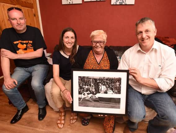 Gayle Hall is presented with a picture of her father, Tower clown Jimmy Buchanan.  She is pictured with (from left) publisher  Steve Richley, Jill Carruthers from Blackpool Museum Project and author Nigel Male.