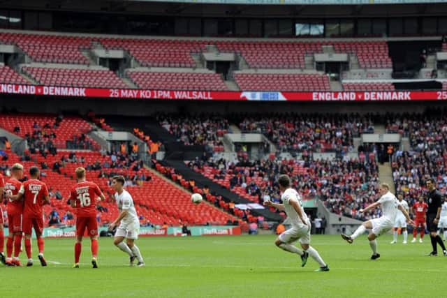 AFC Fylde striker Danny Rowe finds the net with a free-kick against Leyton Orient at Wembley