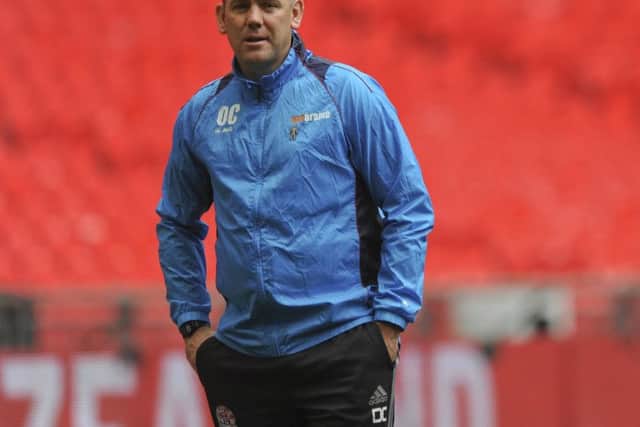 AFC Fylde manager Dave Challinor on the touchline at Wembley