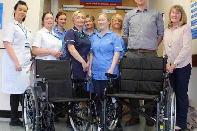Hilary and Paul Stanyon, far right, with staff from the haematology ward at Blackpool Victoria Hospital