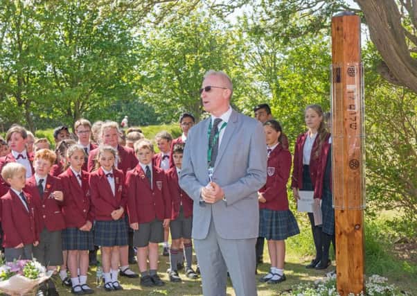 The installation of the Peace Pole at AKS Lytham