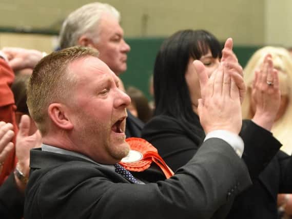 Coun Simon Blackburn celebrating at the election count