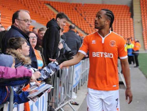 Nathan Delfouneso chats with Blackpool supporters at the end of last season and will be back for the next campaign