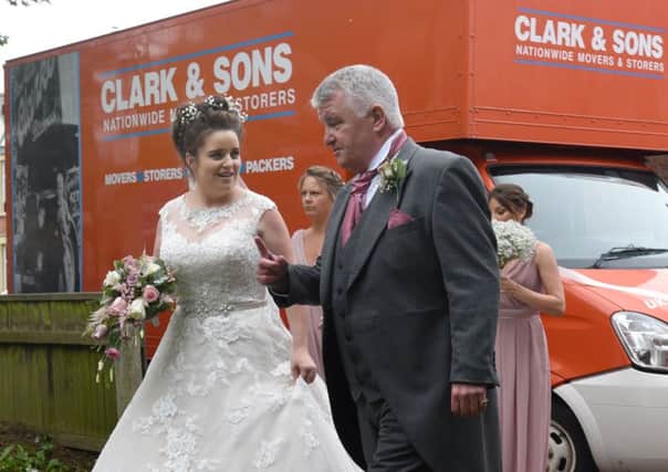 BLACKPOOL  31-05-19
Bride Stacey Morris arrives at the church in a removal van.

A couple who met through a removals business, arranged for removal vans from Clark and Son to take the bridal party to St Paul's Church, Marton, on their wedding day.