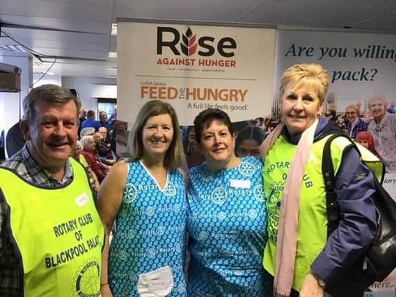 Palatine Rotary Club members took part in a meal pack for Rise Against Hunger