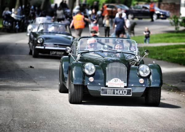 Picture by Julian Brown 09/06/19

Cars start to arrive... a Morgan Plus 8 leads a small convoy

Manchester to Blackpool Classic, Veteran, And Vintage Car Run, Stanley Park, Blackpool