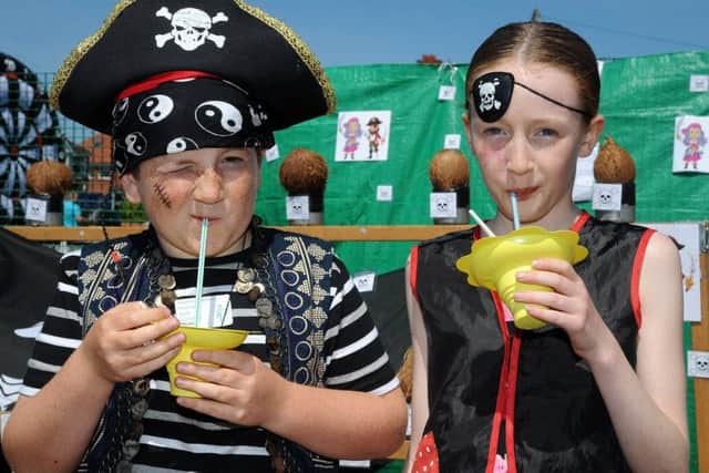 Community fun day in Highfield Park, South Shore.
Enjoying a refreshing drink are pirates Archie and Francesca Dickson.  PIC BY ROB LOCK
24-6-2018