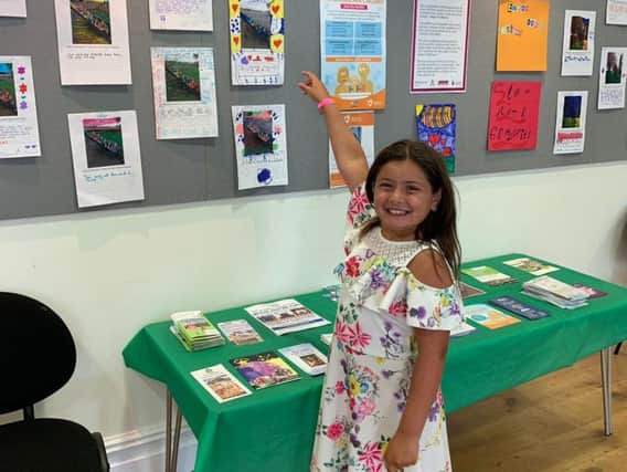 Mayzee-Leigh Everett, eight, from Blackpool Boys and Girls Club which has an exhibition at Stanley Park urging people to think about the environment and not leave dog mess or litter