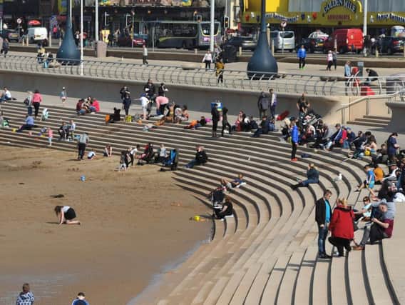 Tourists on Blackpool seafront this Easter