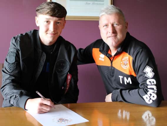 Nathan Shaw puts pen to paper on his new deal