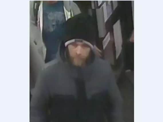 A CCTV image of a man the police want to speak to.