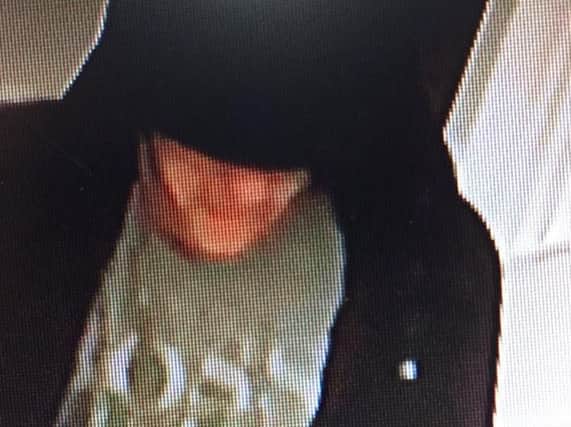 Police want to identify this man after a burglary at a property in New South Promenade, Blackpool on May 26.