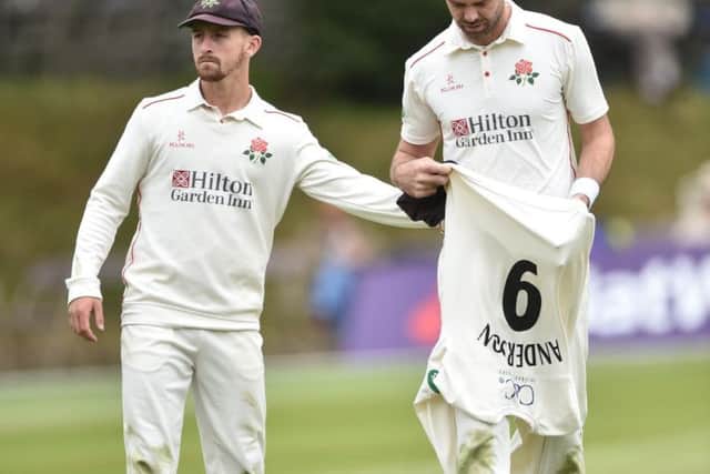 Josh Bohannon watches the injured James Anderson leave the field at Sedbergh Picture: GETTY IMAGES