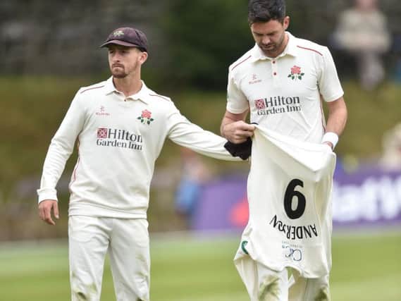 Josh Bohannon watches the injured James Anderson leave the field at Sedbergh Picture: GETTY IMAGES
