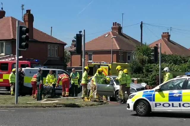 Fire crews and police at the scene of a serious crash at the junction of Squires Gate Lane and Weeton Avenue in Blackpool this afternoon (July 3)