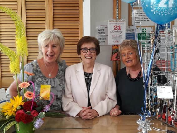 Shop manager Mags Evans, N-Vision chief executive officer Ruth Lambert and deputy shop manager Shenna Hanna