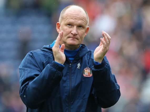 Simon Grayson takes charge of his first game as manager in what is his second stint