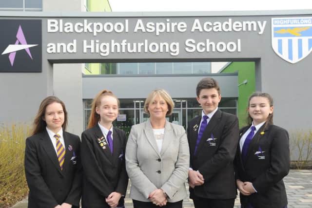 Staff and pupils at Aspire Academy celebrated after achieving a 'good' rating from Ofsted last year. Pictured are pupils Kaja Baran, 15, Rebecca Fuller, 12, Joseph McGuinness, 13 and Lucy-Mae Cheatle, 13 with outgoing headteacher Lisa Shuttleworth-Brown.
