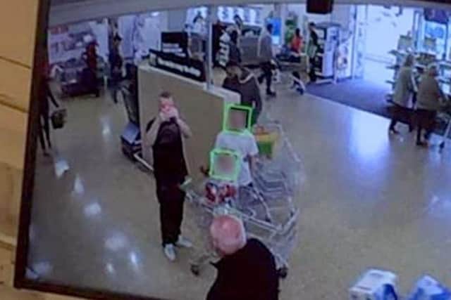 Shoppers' faces are captured with a green box as they arrive at the store