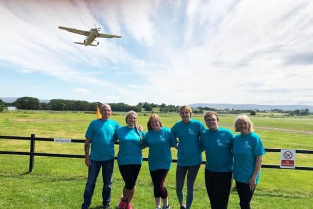 Part of the 21-strong team taking part in the latest skydive