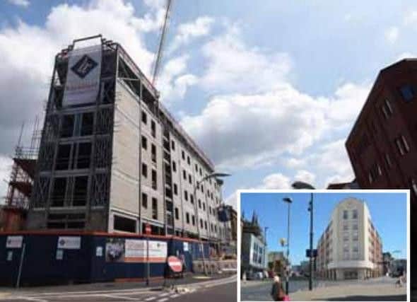 The hotel, pictured earlier this week, is set to open next spring. Inset: What it will look like once finished