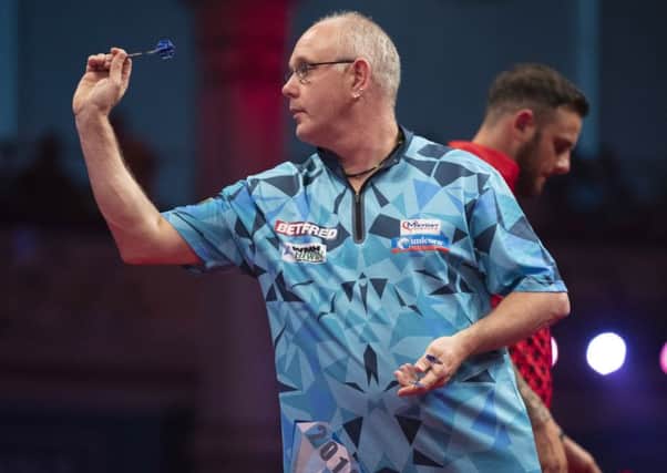 Ian White enjoyed an emphatic victory against Joe Cullen        Picture: Lawrence Lustig/PDC
