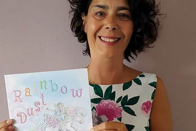 SJ Dawson, author of Rainbow Dust