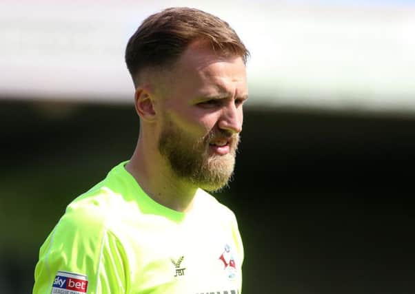 Jak Alnwick has joined Blackpool on a season-long loan deal from Rangers