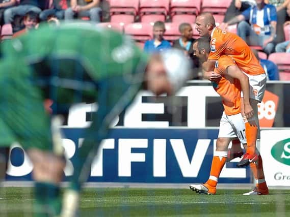 Blackpool enjoyed a memorable opening day victory at Wigan in 2010