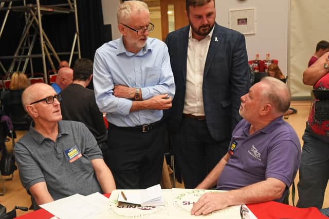 Jeremy Corbyn and Chris Webb meet delegates at the green event.