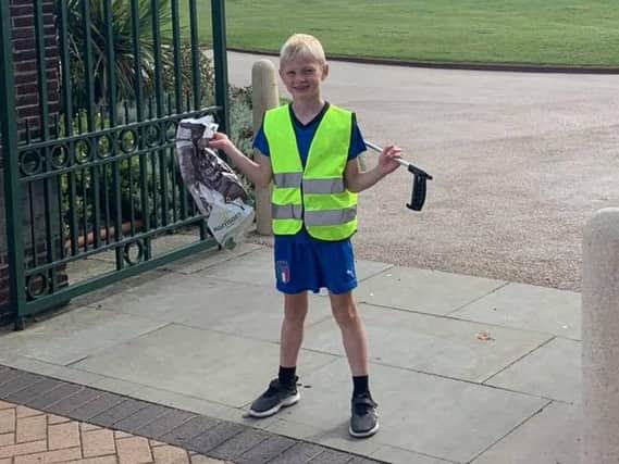 Six-year-old Brodie Atkinson, litter-picking in Fleetwood. Credit: Angie Atkinson