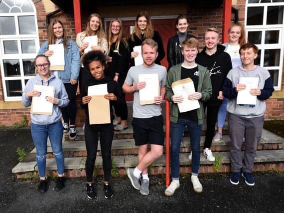 Students from Baines Sixth Form receive their A Level results