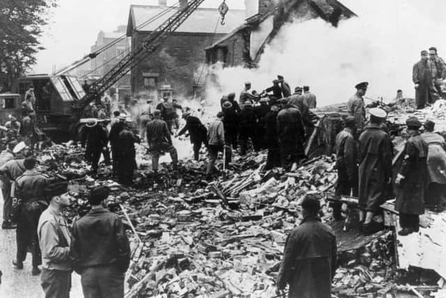 The scene of carnage after a B-24 Liberator bomber from the US Airforce base at Warton crashed on the Freckleton village school.