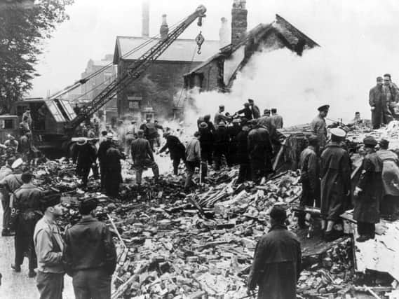 The scene of carnage after a B-24 Liberator bomber from the US Airforce base at Warton crashed on the Freckleton village school.