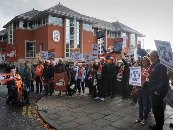 Blackpool fans protest outside the EFL's headquarters in Preston last year