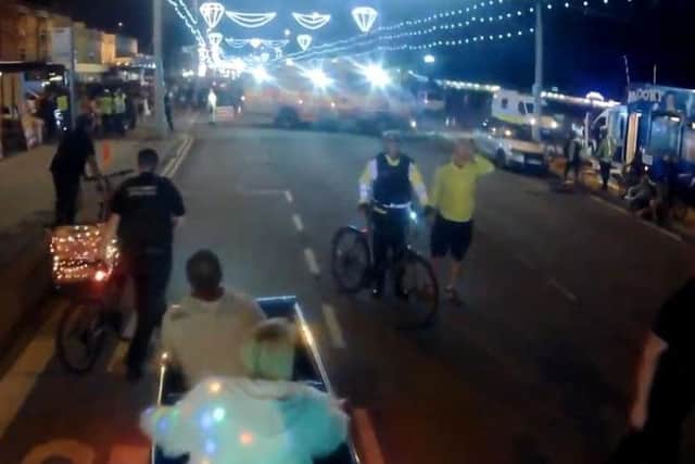 A camera mounted to a tandem bike captured the scene.