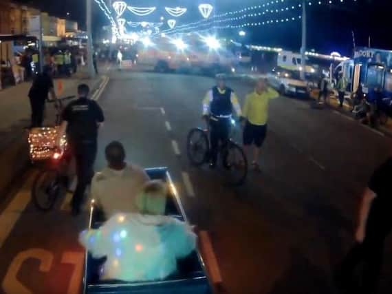 A camera mounted to a tandem bike captured the scene.