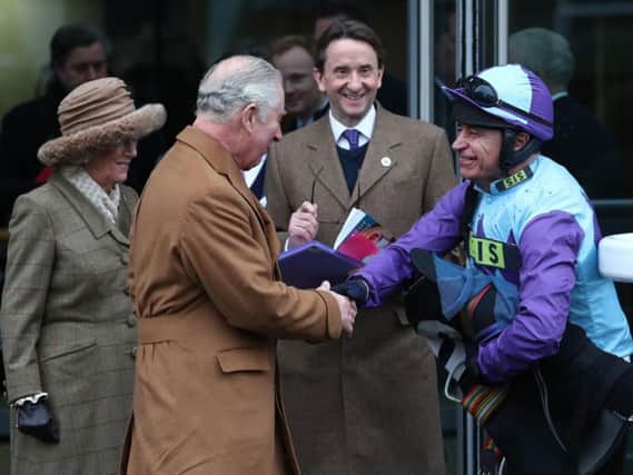Poulton jockey Maurice McCarthy (right), here meeting the Prince of Wales at The Prince's Countryside Fund Charity Race at Ascot,  has gone on to greater success this year