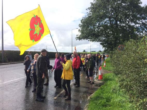 Protesters in Lancashire marched against fracking to the beat of a drum and spurred on by passing car drivers tooting their horns.