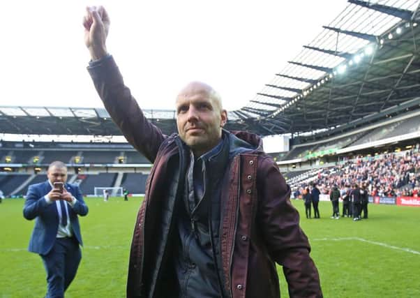 MK Dons boss Paul Tisdale steered them to promotion last season