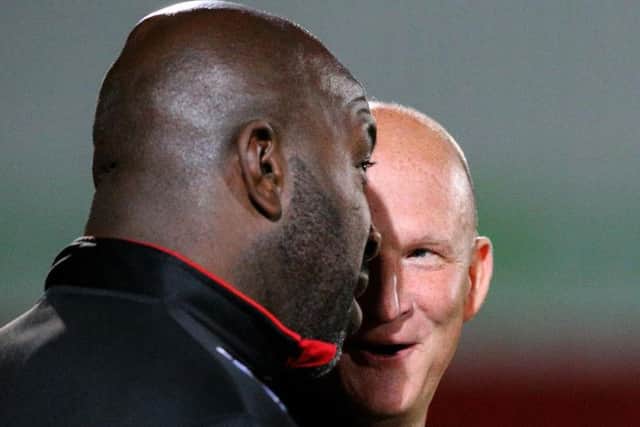 Doncaster boss Darren Moore with Simon Grayson