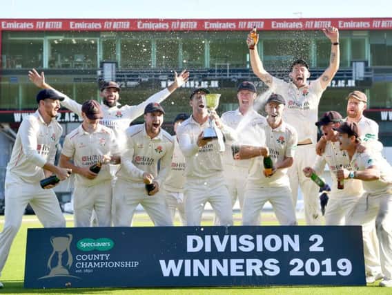 Unbeaten Lancashire lift the County Championship Division Two trophy after victory over Middlesex Picture: PRESS ASSOCIATION