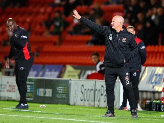 Simon Grayson dropped Blackpool's two top goalscorers in a selection shock at Doncaster