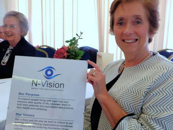N-Vision chief executive Ruth Lambert with the charitys new logo